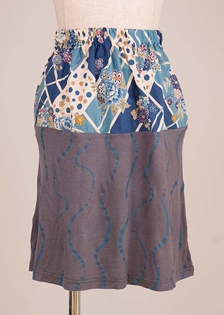 A mini skirt with a Japanese pattern switching with a GOUK wave print